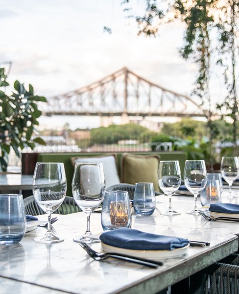 Event venue table setting in front of the story bridge, Brisbane